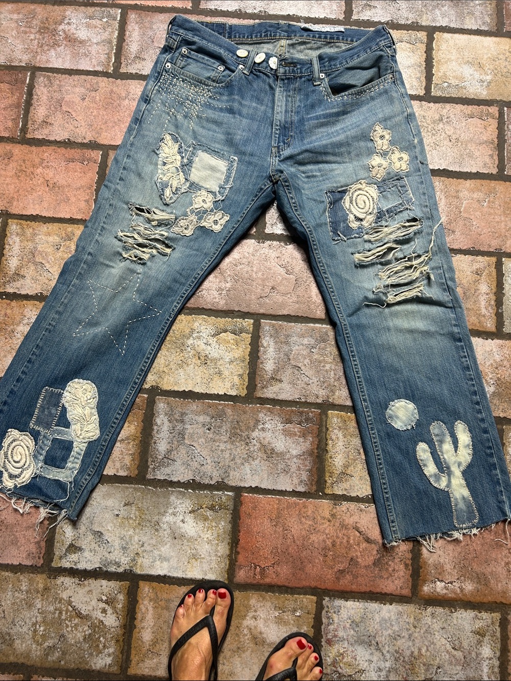 Women's Blue Distressed Cropped Jeans with Embroidered Patches